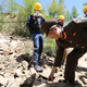 A North Korean official points a file of stones as he explains to journalists after the second tunnel of Punggye-ri nuclear test ground was blown up during the dismantlement process in Punggye-ri, North Hamgyong Province, North Korea May 24, 2018. Picture taken May 24, 2018.